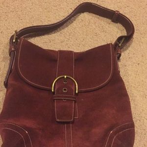 Red suede coach bag